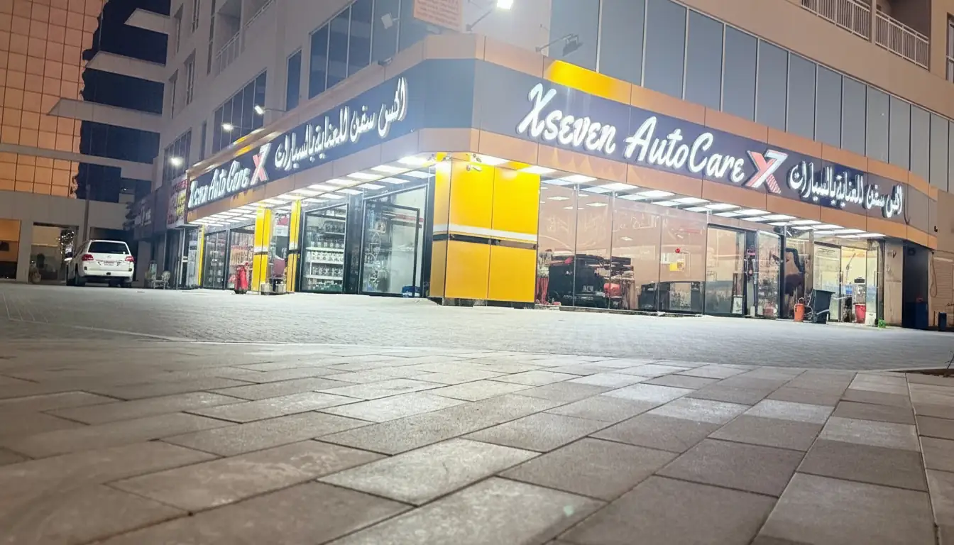 X7 Auto Care storefront at night in Khalifa City, Abu Dhabi